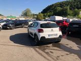 a lot of cars that are parked in a parking lot