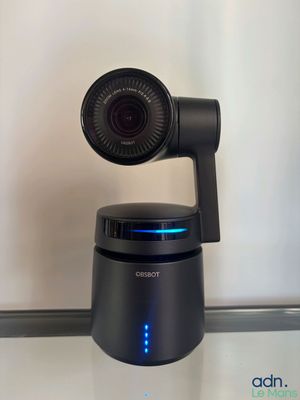 a close up of a camera sitting on top of a glass table