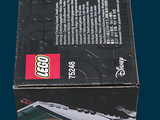 a box with a lego train on it on a blue background