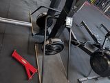 an image of a gym room with equipment on the floor