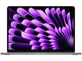 an apple macbook pro laptop with a purple flower design on the screen