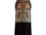 a bottle of wine that is sitting on a table