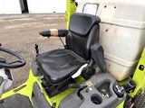 an image of a lawn mower with a tank on the back