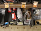 many boxes of electronics on a shelf in a store