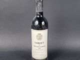 a bottle of wine that is sitting on a table