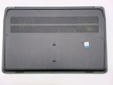 a close up of a laptop on a white surface