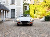 an image of a car parked in front of a house