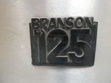 a metal sign that says branson 25 on it