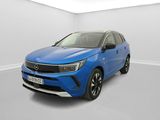 a blue car is parked in a white room with a white floor