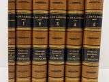 un lot de six livres anciens aux couvertures noires et dorées