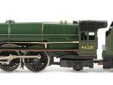 a toy train that is sitting on a white surface