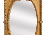 une image d'un miroir avec un cadre doré sur un fond blanc