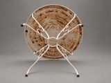 an image of a plate on a stand on a gray background