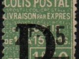 a green and black stamp with the letter d on it