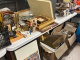 a table with many items on it in a room