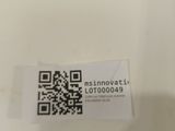 a qr code on the back of a toilet seat