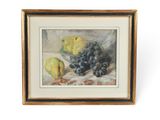 tableau représentant une nature morte composée de raisins et de citrons, dans un cadre doré