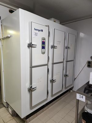 an image of a refrigerator in a kitchen with a lot of doors