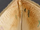 a close up of a piece of cloth with writing on it