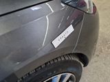 a close up of a car with a sticker on the front of it