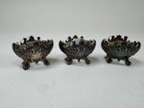 three antique silverplated dishes on stands