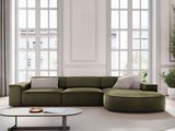 an image of a modern living room with a green couch