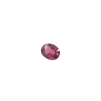 a close up of a pink diamond on a white background