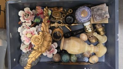 a box full of assorted items sitting on a table