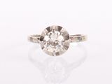 an old cut diamond ring set in 18k white gold