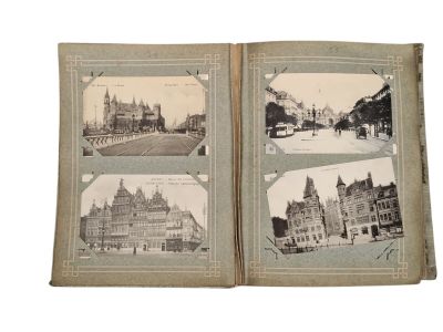 an old photo of a book with pictures of old buildings