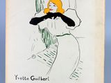 un vieux livre sur lequel figure le dessin d'une femme en robe blanche