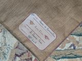 a close up of a piece of fabric with a label on it
