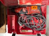 an image of a red tool box with tools in it