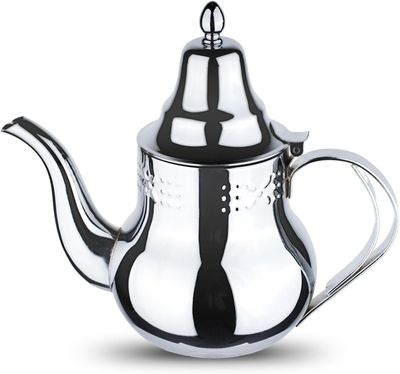 une théière en argent avec une anse noire sur fond blanc