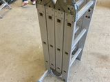 a metal rack that has a bunch of tools on it