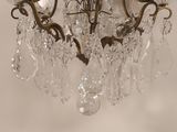 an image of a chandelier with crystal drops hanging from it ' s ceiling