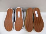 three pairs of vans slip ons are lined up on a white surface