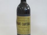 a bottle of wine that is sitting on a table