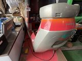 a motor boat that is sitting in a garage