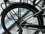 a bike that is parked in front of a window