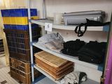 a room that has a bunch of shelves and boxes on it