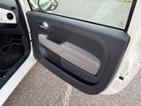 a car door with the door handle open and the door handle down