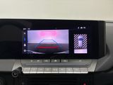 a picture of a car ' s dashboard with a camera on it