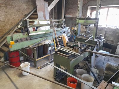 a picture of a machine shop with a lot of tools