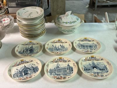 many plates that are sitting on a table