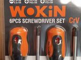three screw screwdrivers in a package on a table
