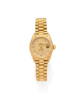 rolex a lady ' s 18ct gold diamond set wristwatch