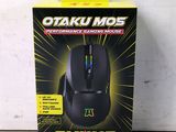 a box of a gaming mouse sitting on top of a table