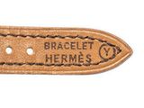 a close up of a brown leather belt with a metal buckle