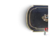 a black and gold book with a crown on top of it